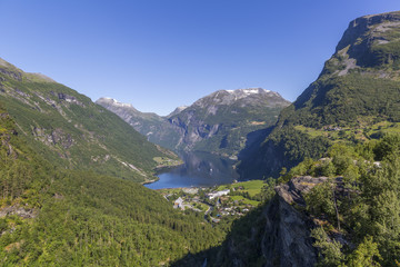 Beautiful view of Geiranger fjord and valley from Flydalsjuvet Rock
