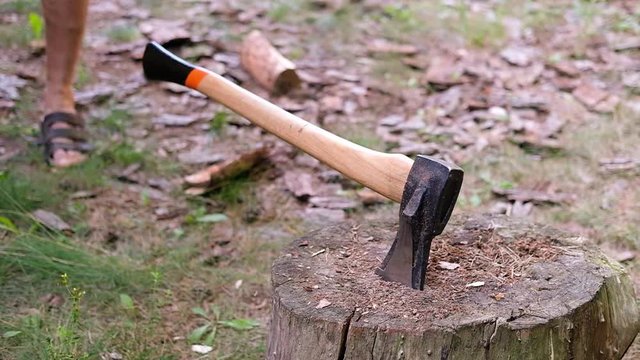 chopping firewood with an ax