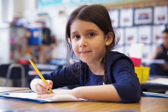 A student in a kindergarten classroom. 