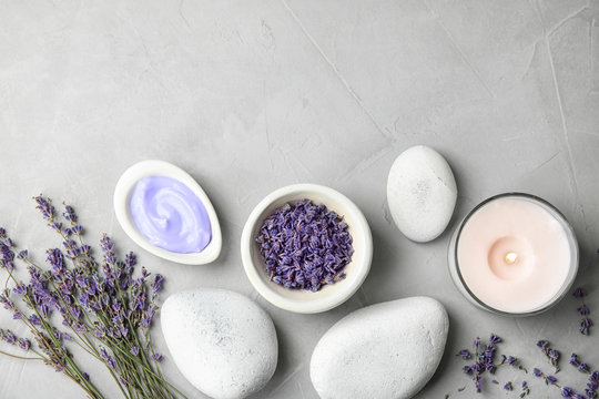 Fototapeta Flat lay composition with lavender flowers and natural cosmetic on grey background