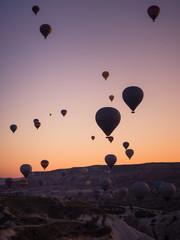 A lot of colourful balloons at dawn in Cappadocia