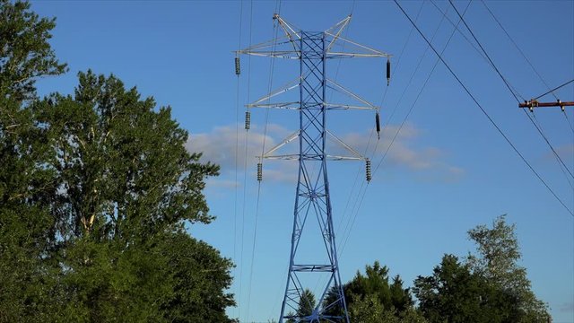 High voltage transmission power line with glass isolators.