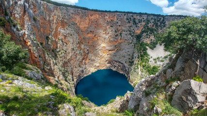 Red Lake (Croatian: Crveno jezero) is a collapse doline (collapse sinkhole) containing a karst lake...
