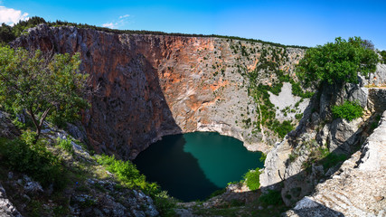 Red Lake (Croatian: Crveno jezero) is a collapse doline (collapse sinkhole) containing a karst lake...