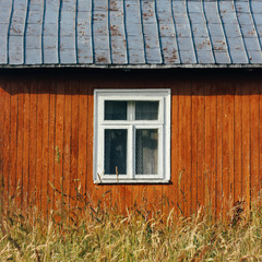 beautiful rustic wooden old building in sunny garden, exploring country, abandoned life, travel concept