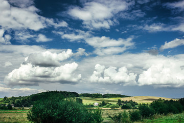 amazing clouds on blue sky and country side, beautiful summer nature landscape