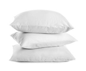 Clean soft bed pillows on white background