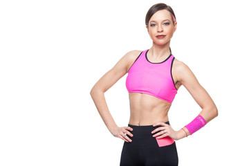 Fototapeta na wymiar Fitness woman portrait isolated on white background. Smiling happy female fitness model looking at camera. Fresh beautiful multi-racial Caucasian Asian fitness girl. pink top.