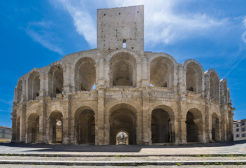 Fototapeta premium Roman amphitheater in historic city center of Arles. Buches du Rhone, Provence, France, Europe..