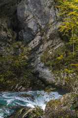Nature autumn landscape. Waterfall at Soteska Vintgar Slovenia. The Vintgar Gorge or Bled Gorge.