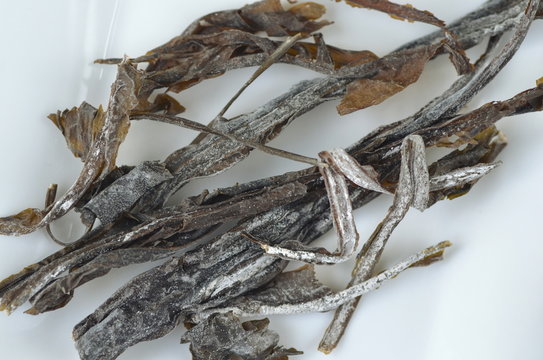 Top view of sea salt covered dried wakame seaweed