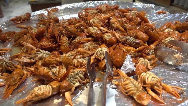 Cooked crawfish in the Buffet restaurant. Concept of luxury recreation and eating at an expensive resort.