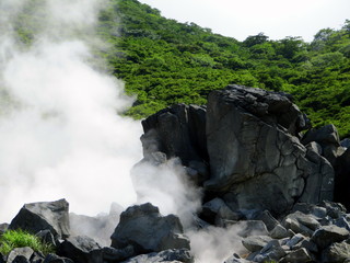 steaming hot sulfur pools in hakone national park, japan