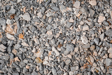 the continuous space filled with  granite gravel texture , White pebbles stone background, gravel stone wallpaper, landscape concept pattern .