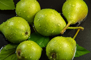 Green pears with water  drops