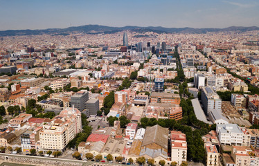 Fototapeta premium Aerial view of district of Barcelona with modern apartment buildings