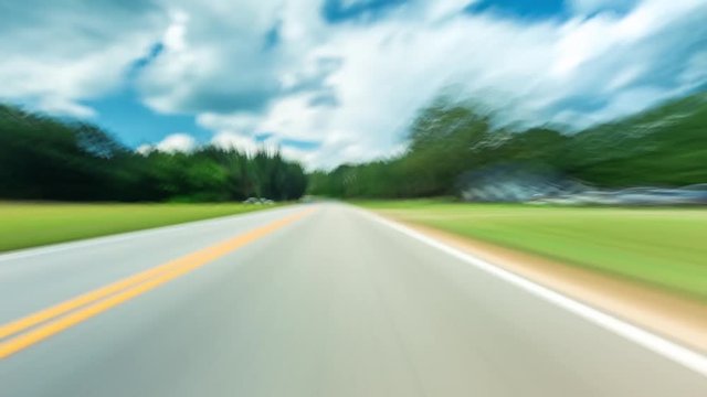 POV time-lapse from a car driving down the road
