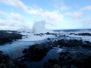 Wave crashes over Tide pools