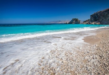 Beautiful beach on coast of Ionian Sea in Albania, Ksamil, Saranda region.