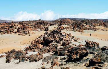 Man crossing through the path of volcanic environment, Tenerife island