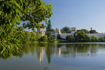 Fototapeta na wymiar Orthodox monastery on the shore of the lake.