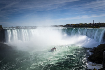Obraz na płótnie Canvas Ship close to Niagara Falls waterfall