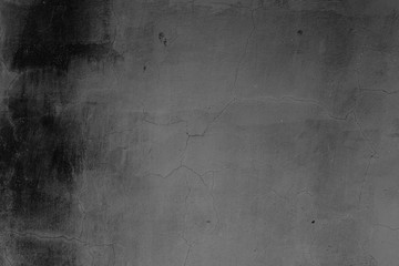Wall fragment with scratches and cracks