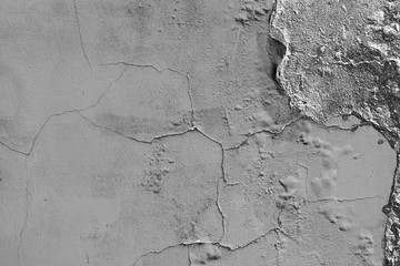 Wall fragment with scratches and cracks