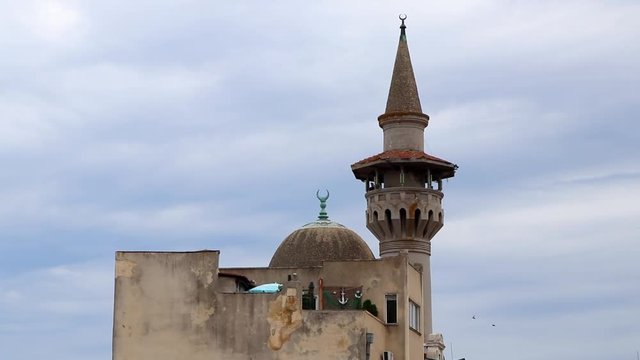 Birds Flying Around a Mosque in Romania, Static Slow Motion