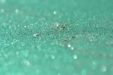 Cyan background with glitter.