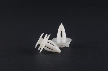 plastic clips for cars on a black background