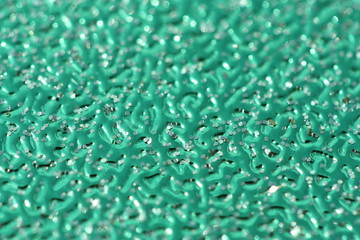 Cyan background with glitter.