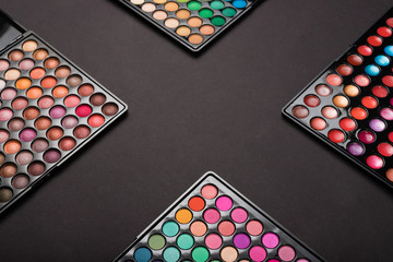 Makeup colorful eyeshadow palettes as background
