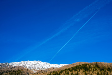 Amazing winter ski resort mountain view with skiing slopes and mighty mountains.