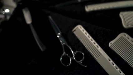 Vintage barber shop tools, dark background, selective focus. Frame. Barber shop tools on the table. Close up view shaving foam. Barber shop concept. Hair Salon Tools. Barber Scissors And Shaving
