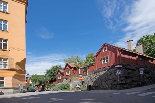 Old red wood homes in hills of Sodermalm