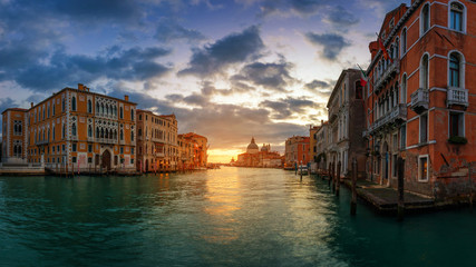 Sunrise in Venice. Image of Grand Canal in Venice, with Santa Maria della Salute Basilica in the background. Venice is a popular tourist destination of Europe. Venice, Italy.