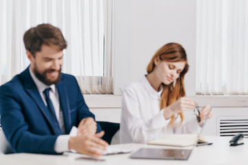 young couple in the office