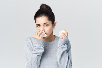 woman runny nose flu