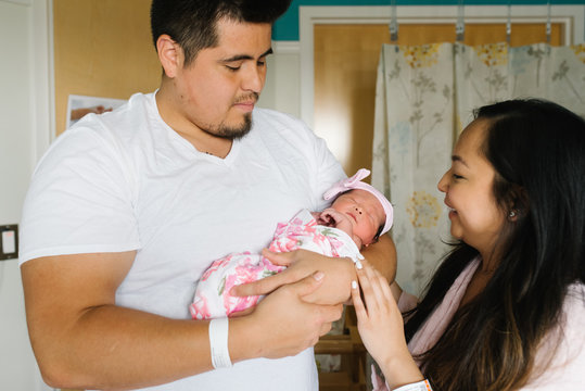 Mother and father with newborn
