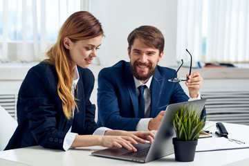 man and woman in the office