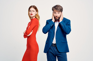 young couple on a light background emotions