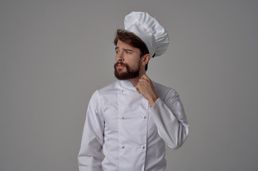 a cook with a beard looks at a free place