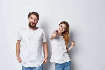 young couple in white t-shirts