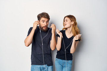 young couple with headphones