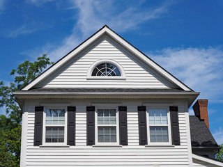 gable of white clapboard house