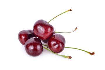 whole fresh cherry with stem on white background