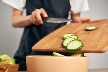 cutting cucumber kitchen