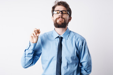 business man in glasses with a bitcoin beard