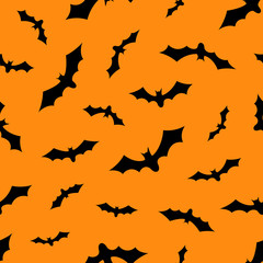 Obraz premium Set of bats silhouettes flying isolated on orange background
